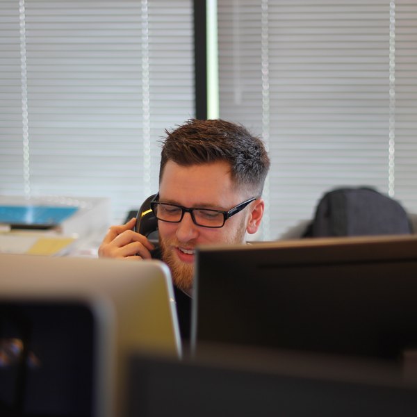berkeley-communications-WEDDt-u3q3o-unsplash Person on phone