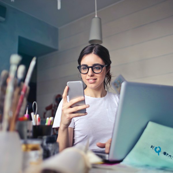 bruce-mars-FWVMhUa_wbY-unsplash Reading something on phone