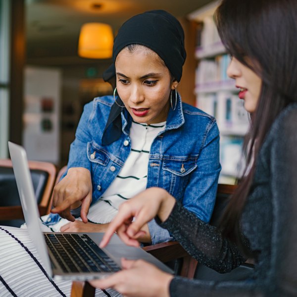 Two people working